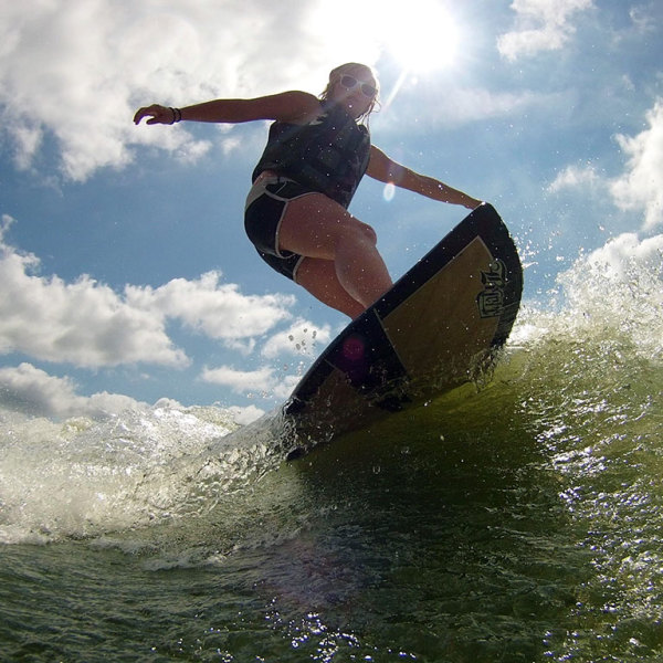 monopod off the back of a boat wake surfer photography